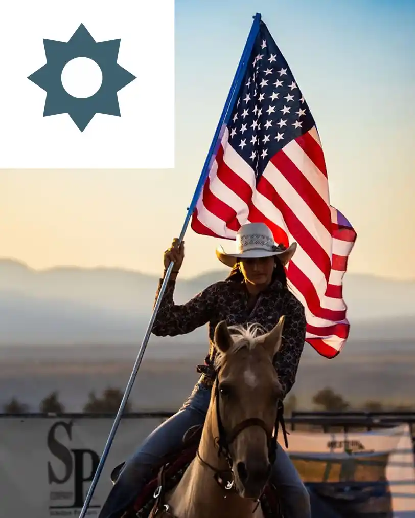 Horse rider carrying the American flag